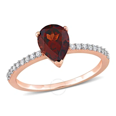 Amour 1 1/3 Ct Tgw Pear Shape Garnet And 1/7 Ct Tdw Diamond Ring In 14k Rose Gold In Red