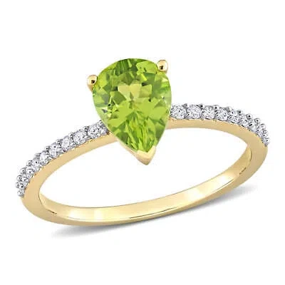 Pre-owned Amour 1 1/7 Ct Tgw Pear Shape Peridot And 1/7 Ct Tdw Diamond Ring In 14k Yellow