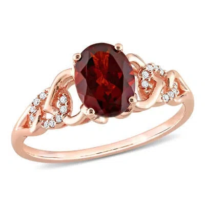Pre-owned Amour 1 3/8 Ct Tgw Oval Garnet And Diamond Accent Link Ring In 10k Rose Gold In Pink