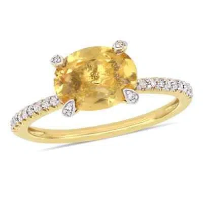 Pre-owned Amour 1 5/8 Ct Tgw Oval-cut Citrine And 1/10 Ct Tw Diamond Ring In 10k Yellow In Check Description