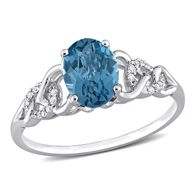 Pre-owned Amour 1 5/8 Ct Tgw Oval London Blue Topaz And Diamond Accent Link Ring In 10k In White
