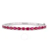Amour 11-1/4 Ct Tgw Oval-cut Created Ruby Bangle In Sterling Silver In Red