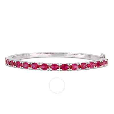 Amour 11-1/4 Ct Tgw Oval-cut Created Ruby Bangle In Sterling Silver In Pink