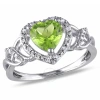 AMOUR AMOUR 1/10 CT TW DIAMOND AND PERIDOT OPEN HEART CROSSOVER RING IN STERLING SILVER