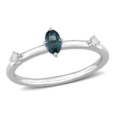 Pre-owned Amour 1/3 Ct Tgw Oval London Blue Topaz And White Topaz Stackable Ring In 10k