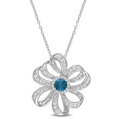 Amour 2 1/4 Ct Tgw London Blue Topaz And White Topaz Flower Pendant With Chain In Sterling Silver