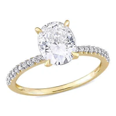 Pre-owned Amour 2 Ct Dew Created White Moissanite And 1/10 Ct Tw Diamond Oval Solitaire