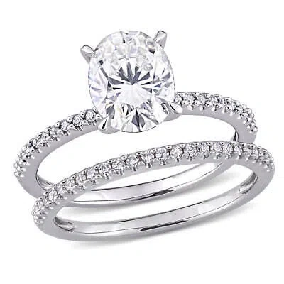 Pre-owned Amour 2 Ct Dew Oval Created Moissanite And 1/4 Ct Tw Diamond Bridal Ring Set In In White