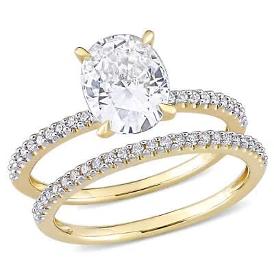 Pre-owned Amour 2 Ct Dew Oval Created Moissanite And 1/4 Ct Tw Diamond Bridal Ring Set In In Yellow