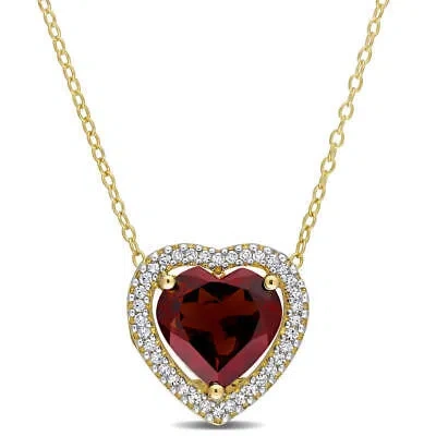 Pre-owned Amour 3 4/5 Ct Tgw Garnet And 1/5 Tw Diamond Halo Heart Necklace With Chain In In Yellow