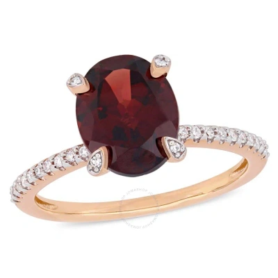 Amour 3 Ct Tgw Oval-cut Garnet And 1/10 Ct Tw Diamond Ring In 10k Rose Gold