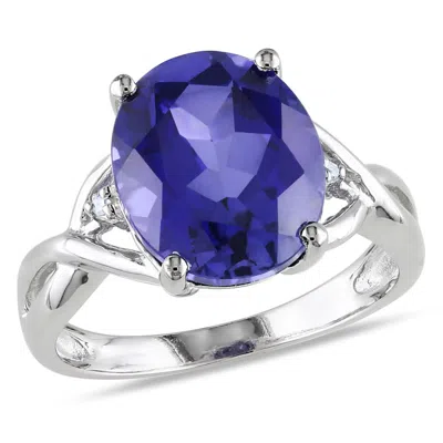 Amour 7 1/2 Ct Tgw Oval Cut Created Blue Sapphire And Diamond Accent Ring In Sterling Silver In ["white"]