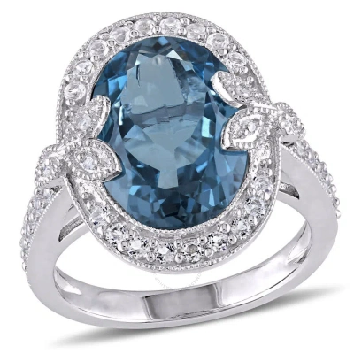Amour 7 7/8 Ct Tgw Oval Cut Blue And White Topaz And Diamond Halo Trillium Cocktail Ring In Sterling