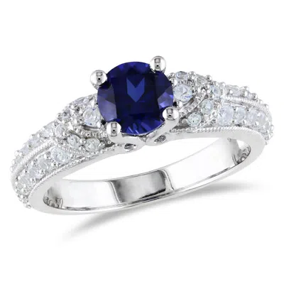 AMOUR AMOUR CREATED BLUE AND CREATED WHITE SAPPHIRE ENGAGEMENT RING IN STERLING SILVER