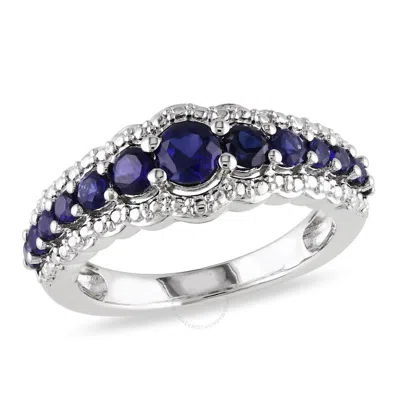 Amour Created Blue Sapphire Graduated Ring In Sterling Silver In White