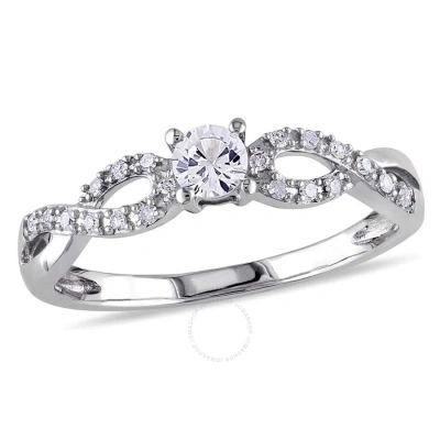 Amour Created White Sapphire And 1/10 Ct Tw Diamond Twist Promise Ring In 10k White Gold In Gold / White