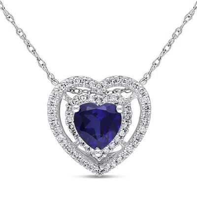 Amour Double Halo Heart Shaped Created Blue Sapphire And 1/5 Ct Tw Diamond Pendant With Chain In 10k In Metallic