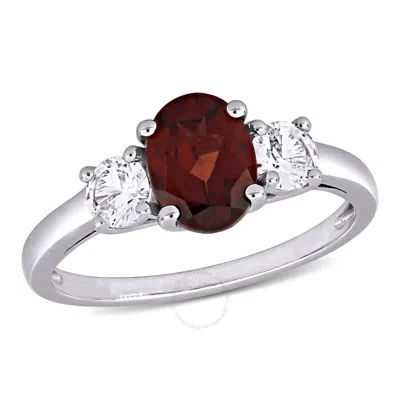 Amour Oval Cut Garnet And Created White Sapphire 3-stone Ring In Sterling Silver In Metallic
