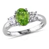 AMOUR AMOUR OVAL CUT PERIDOT AND CREATED WHITE SAPPHIRE 3-STONE RING IN STERLING SILVER
