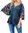 And The Why Move Along Top In Black In Black