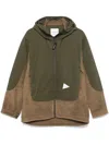 And Wander 9 Top Jacket In Grün