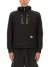 And Wander Alpha Air Jacket In Black