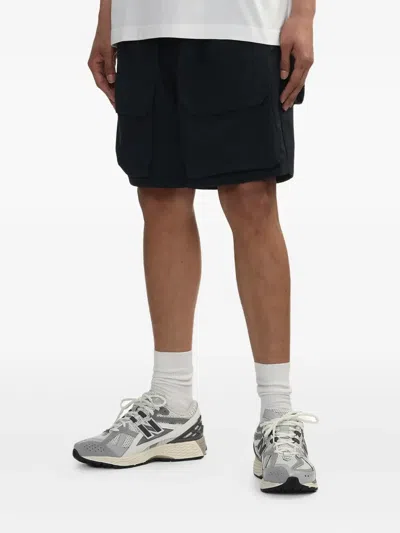 And Wander Belted Shorts In Blue