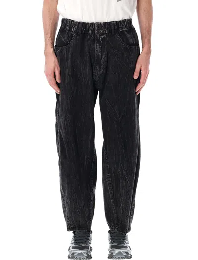 And Wander Black Textured Trousers In Gray