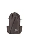 And Wander Diagonal-zip Drawstring Backpack In Brown