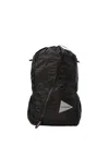 And Wander Drawstring Zip Backpack In Black