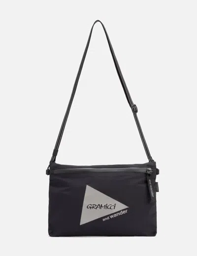 And Wander X Gramicci Logo-print Messenger Bag In Black
