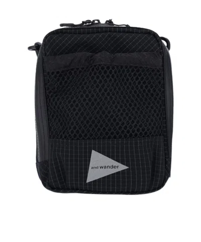 And Wander Crossbody Clutch Bag Adjustable Strap Detail In Black