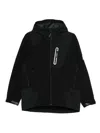 And Wander Stretch Shell Jacket In Black