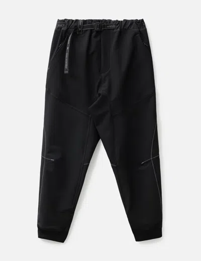 And Wander Light Stretch Shell Pants In Black