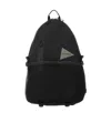 And Wander Logo Printed Backpack In Black