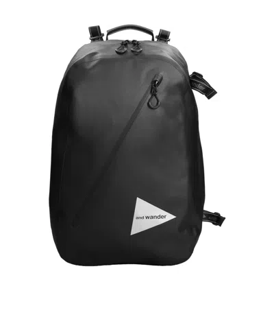 And Wander Logo Printed Zipped Waterproof Backpack In Black