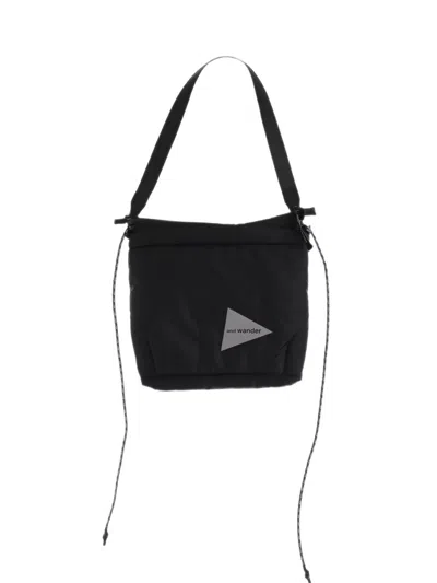 And Wander Logo-print Drawstring Mini Shoulder Bag In Black