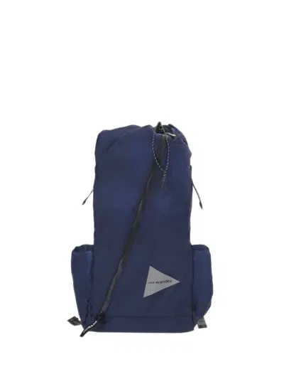 And Wander Logo-print Panelled Backpack In Blue