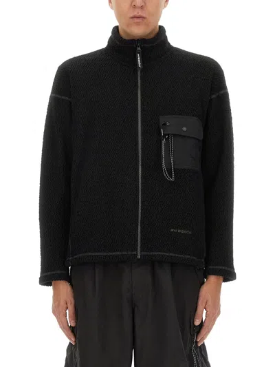 AND WANDER PILE SWEATSHIRT.