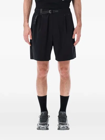 And Wander Technical Mid Length Pleat Front Shorts In Black