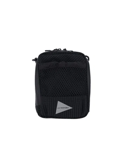 And Wander Reflective Crossbody Pouch Bag In Black  