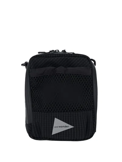 And Wander Reflective Messenger Bag In Black