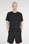And Wander T-shirt In Black Wool In Black