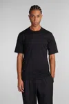 And Wander T-shirt In Black Wool In Black