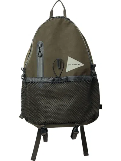 And Wander Triangular-logo Backpack In Green