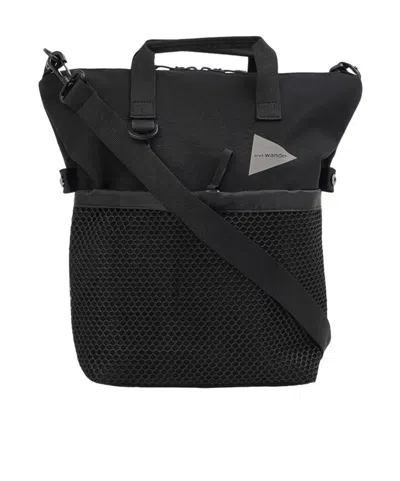 And Wander Zippered Shoulder Bag In Black
