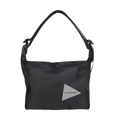 And Wander Zippered Waterproof Shoulder Bag In Black