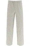 ANDERSSON BELL GEOMETRIC JACQUARD PANTS WITH SIDE OPENING