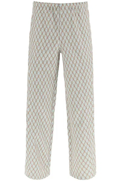 Andersson Bell Geometric Jacquard Pants With Side Opening In Beige