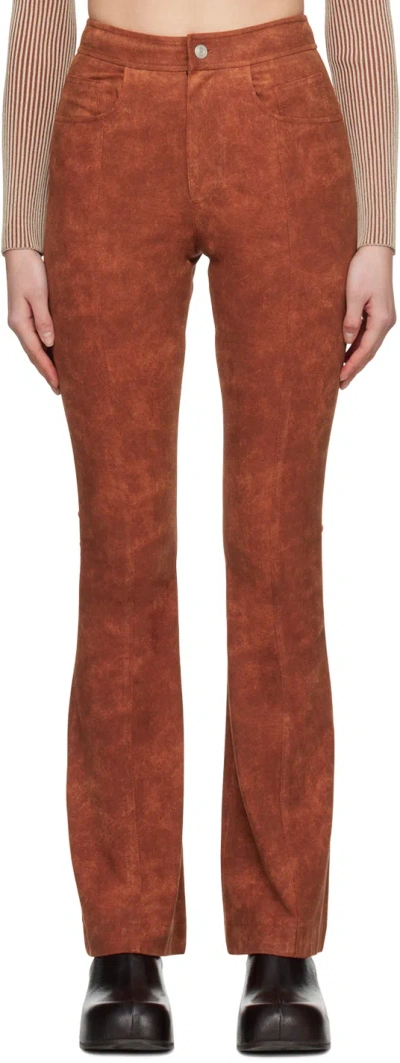 Andersson Bell Orange Paneled Faux-leather Trousers In Brick
